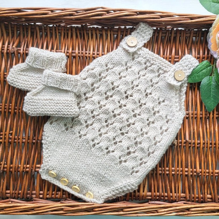 beige knitted baby girl romper and bootie set