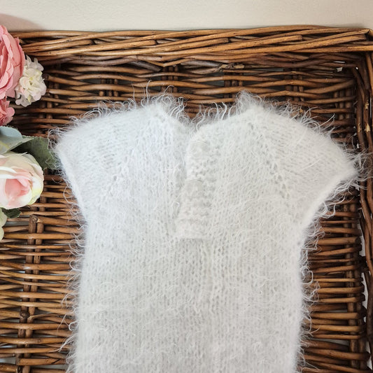 RTS ready to send knitted newborn photography prop romper. Hand made in super soft and fluffy white yarn. The romper is short sleeved, perfect for summer photo shoots. 