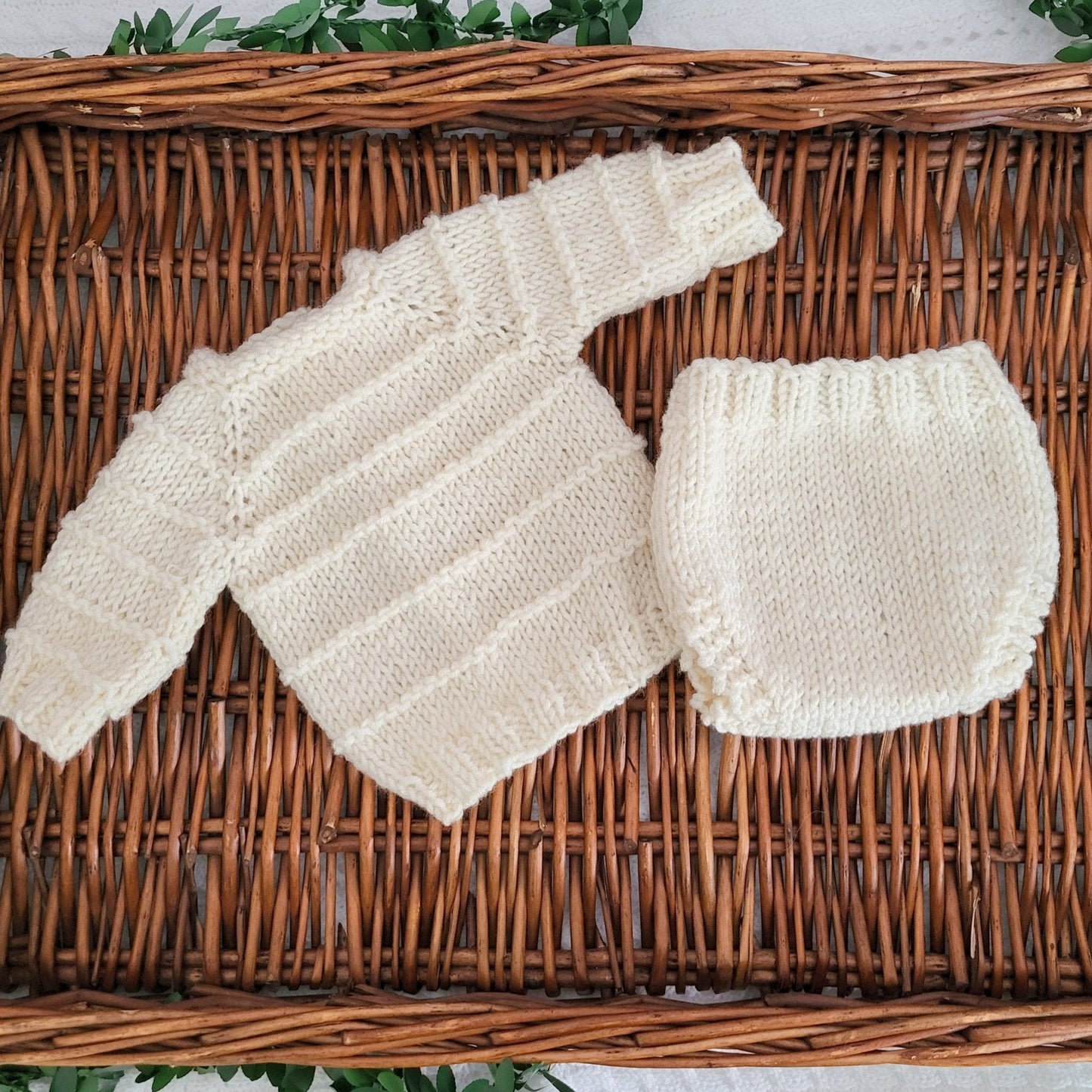 Chunky cream knitted baby sweater and pants set for a newborn baby