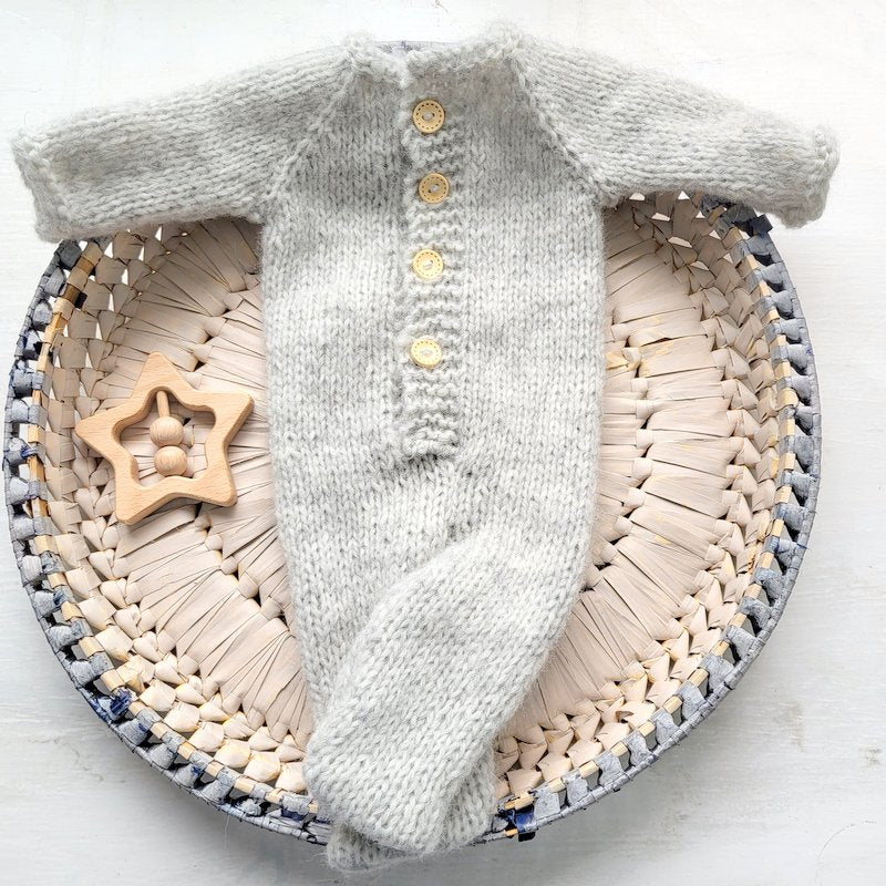 grey knitted newborn onesie with feet
