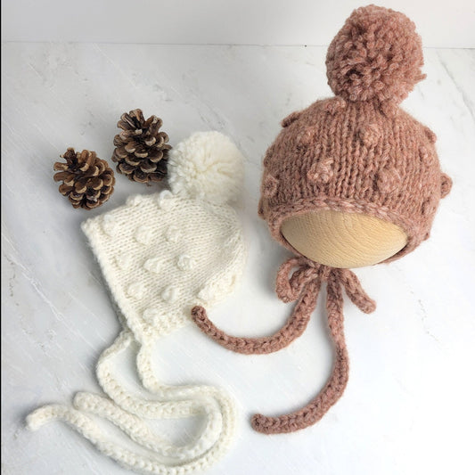 popcorn bubble pom pom baby bonnet in neutrals beige cream brown