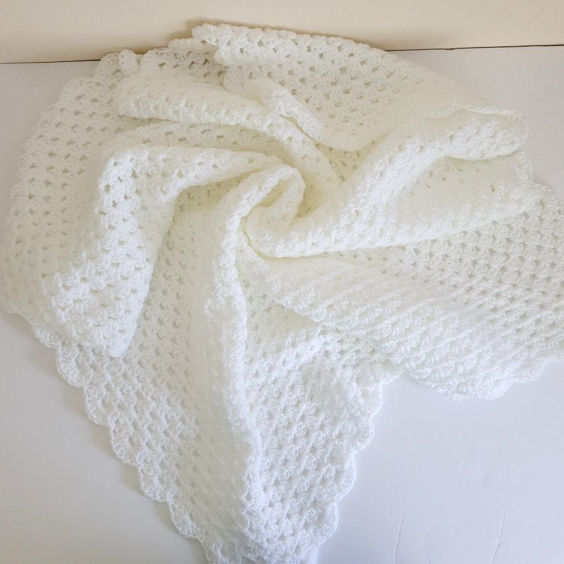 white crochet baby blanket