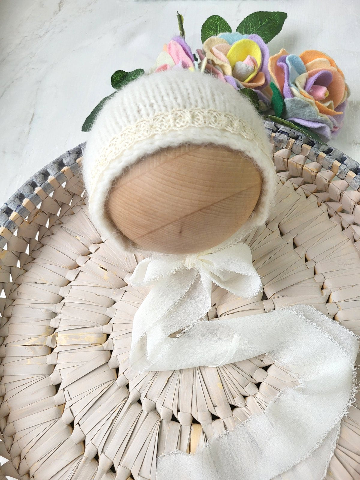 Handknit Cream Newborn bonnet with Ribbon ties and vintage lace trim (Ready to Send)