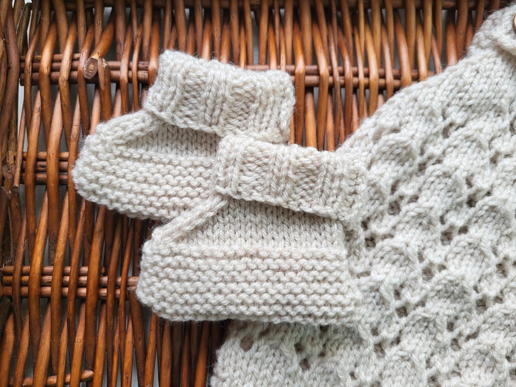 beige knitted baby bootie set