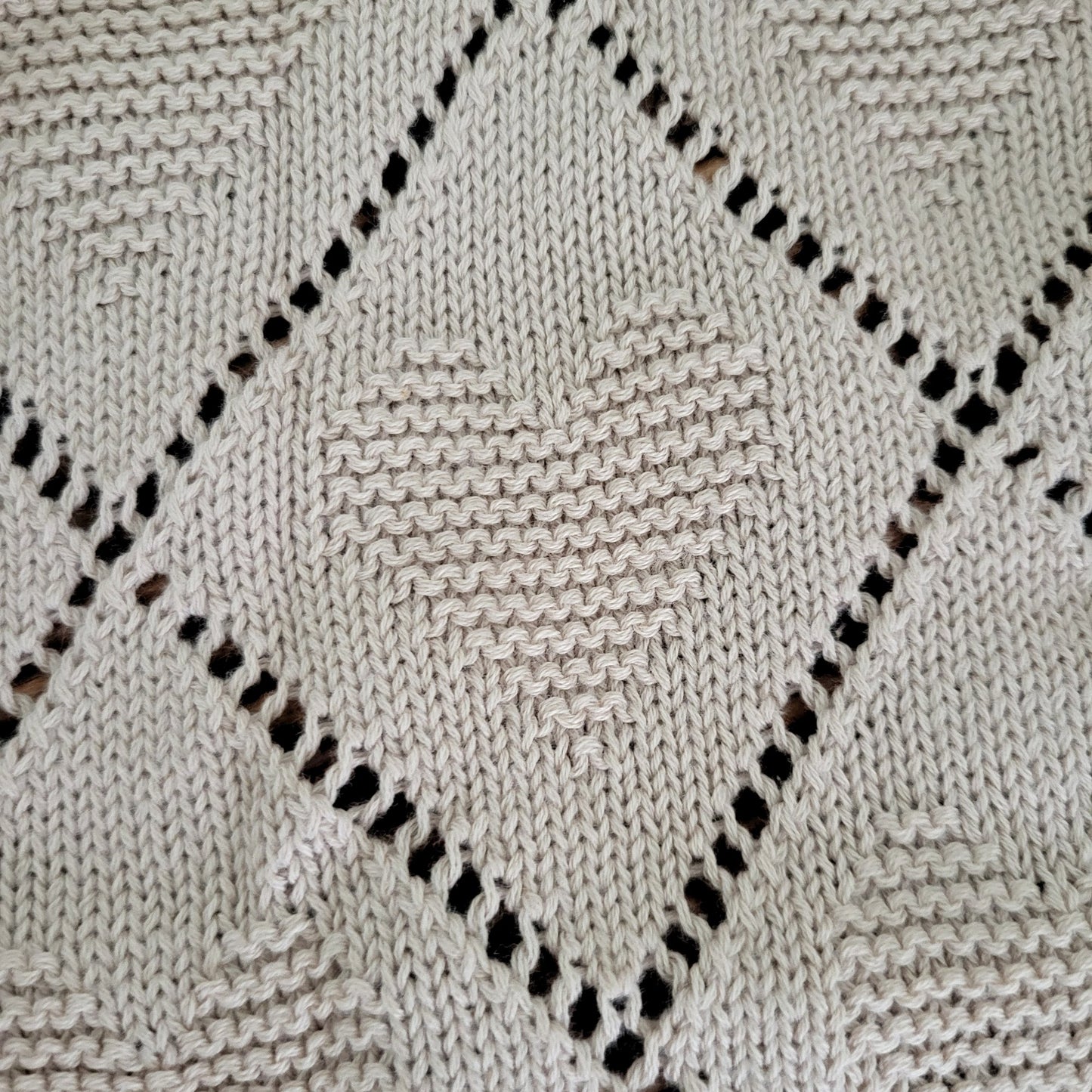 beige knit baby blanket