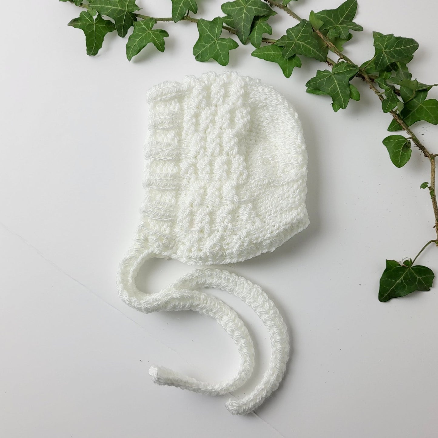 hand knit bonnet in white
