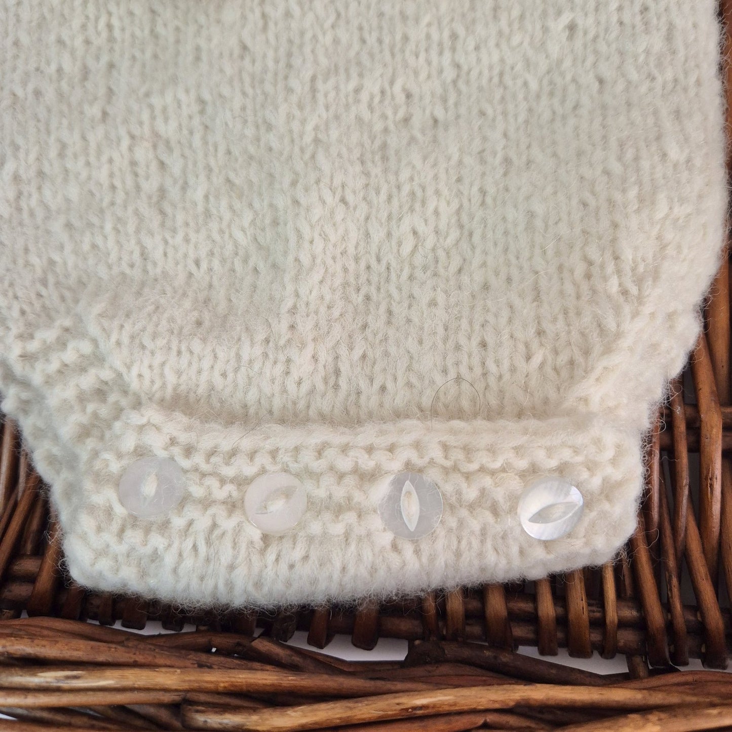 Hand-Knit Baby Boy or Girl Long sleeved Romper and Bonnet Set | 0-3 Months. Cream Bodysuit with matching classic style bonnet.