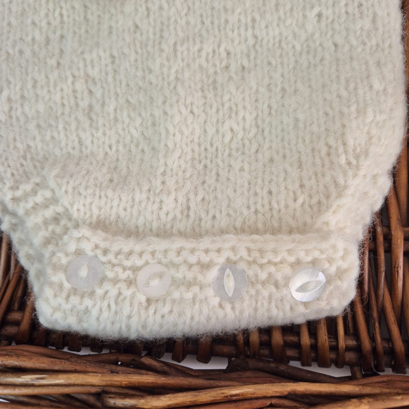 Hand-Knit Baby Boy or Girl Long sleeved Romper and Bonnet Set | 0-3 Months. Cream Bodysuit with matching classic style bonnet.