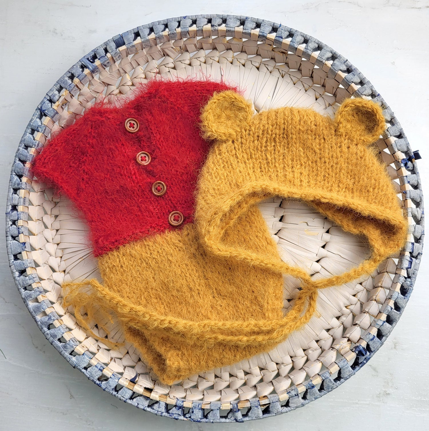 honey brown and red romper and bear ears bonnet to resemble winnie the pooh for a new baby photo session