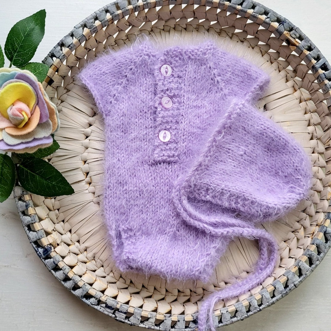 lavender knitted newborn romper and bonnet set in  soft fluffy yarn