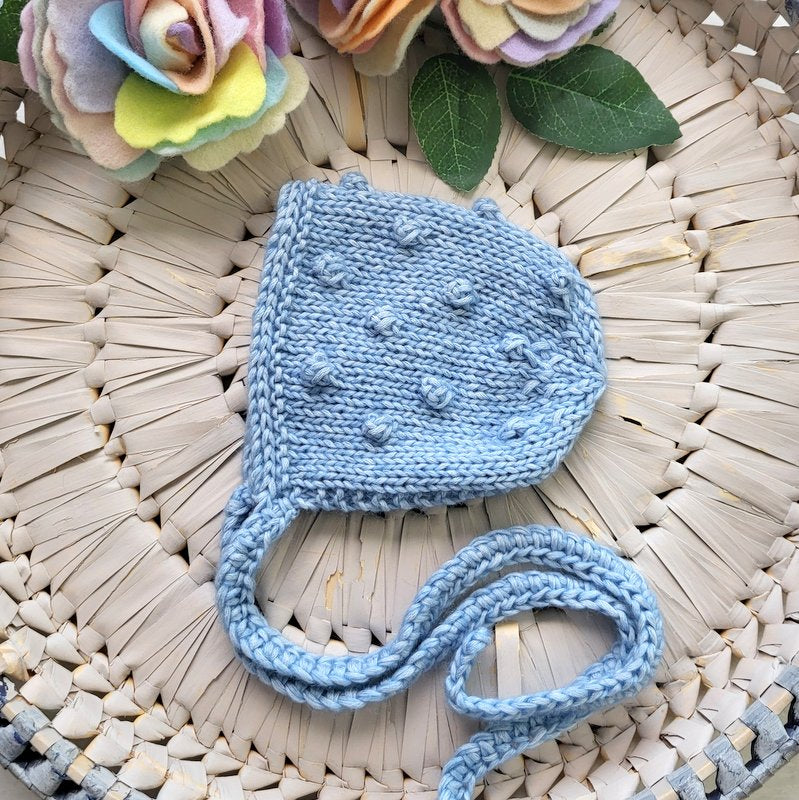 blue baby bonnet with a bubble pattern