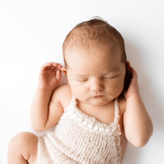 BEIGE KNIT NEWBORN ROMPER WITH LACE FRONT AND HALTERNECK FOR NEWBORN PHOTOGRAPHY