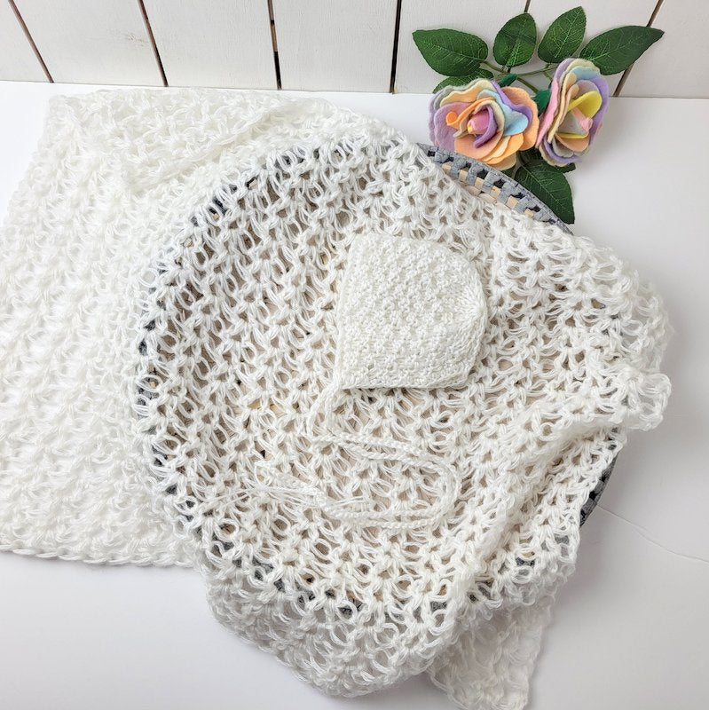 white lacy crochet photo prop layer with matching bonnet