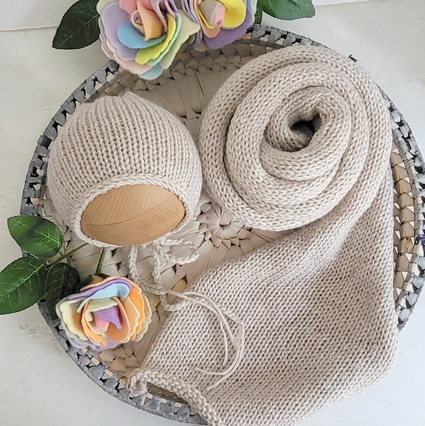 beige knitted stretch wrap and bonnet for newborn photo shoots