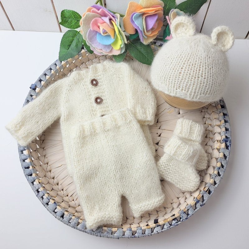 Hand knitted baby clothes online best sale