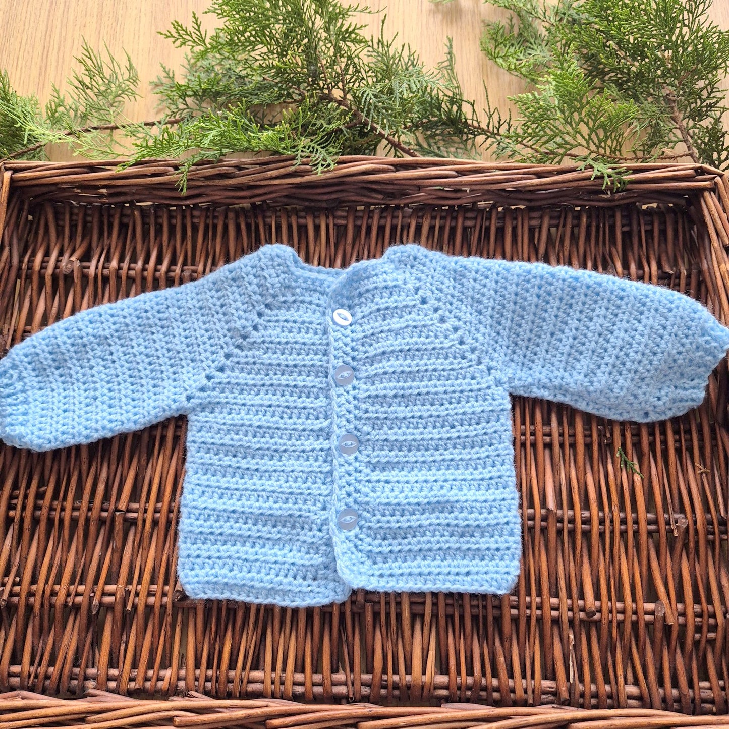 Handmade crochet cardigan for your new baby.