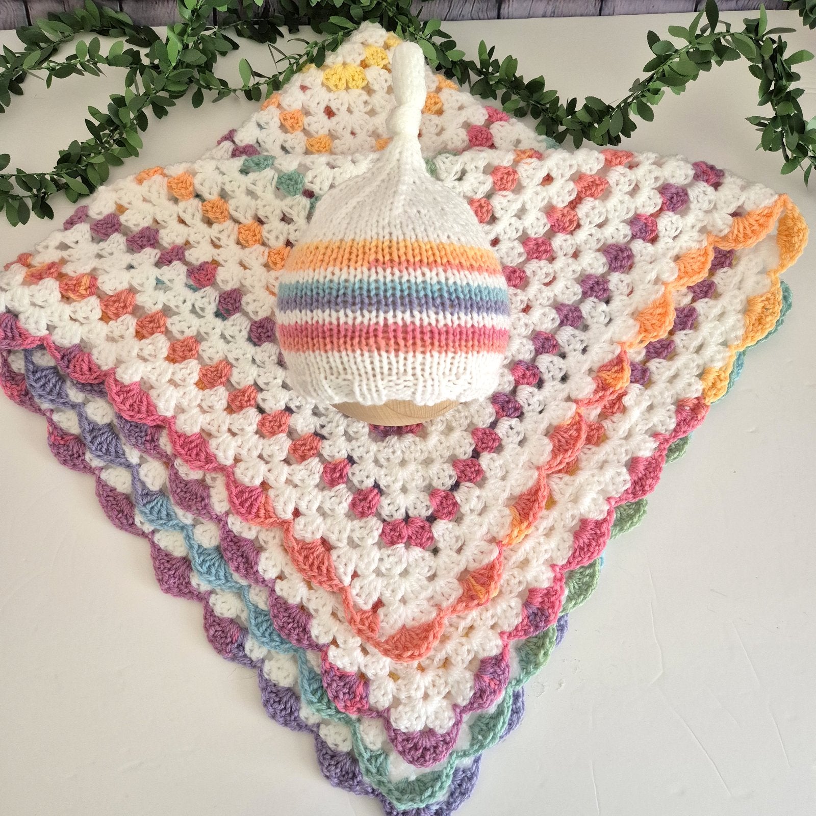 white and rainbow stripes baby blanket with matching hat