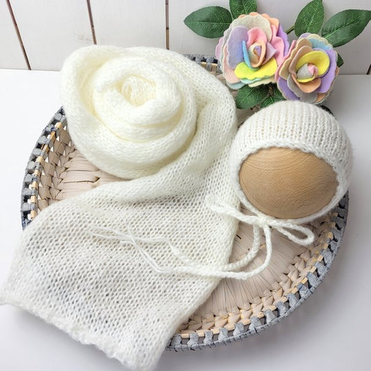 off white knitted stretch wrap and bonnet for newborn photo shoots