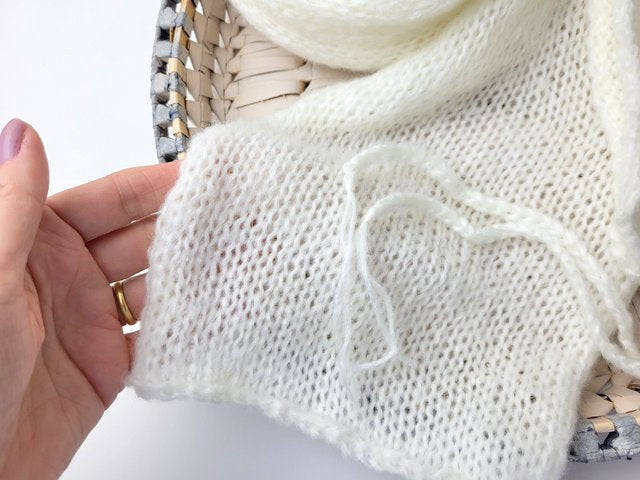 closeup of white knit wrap 