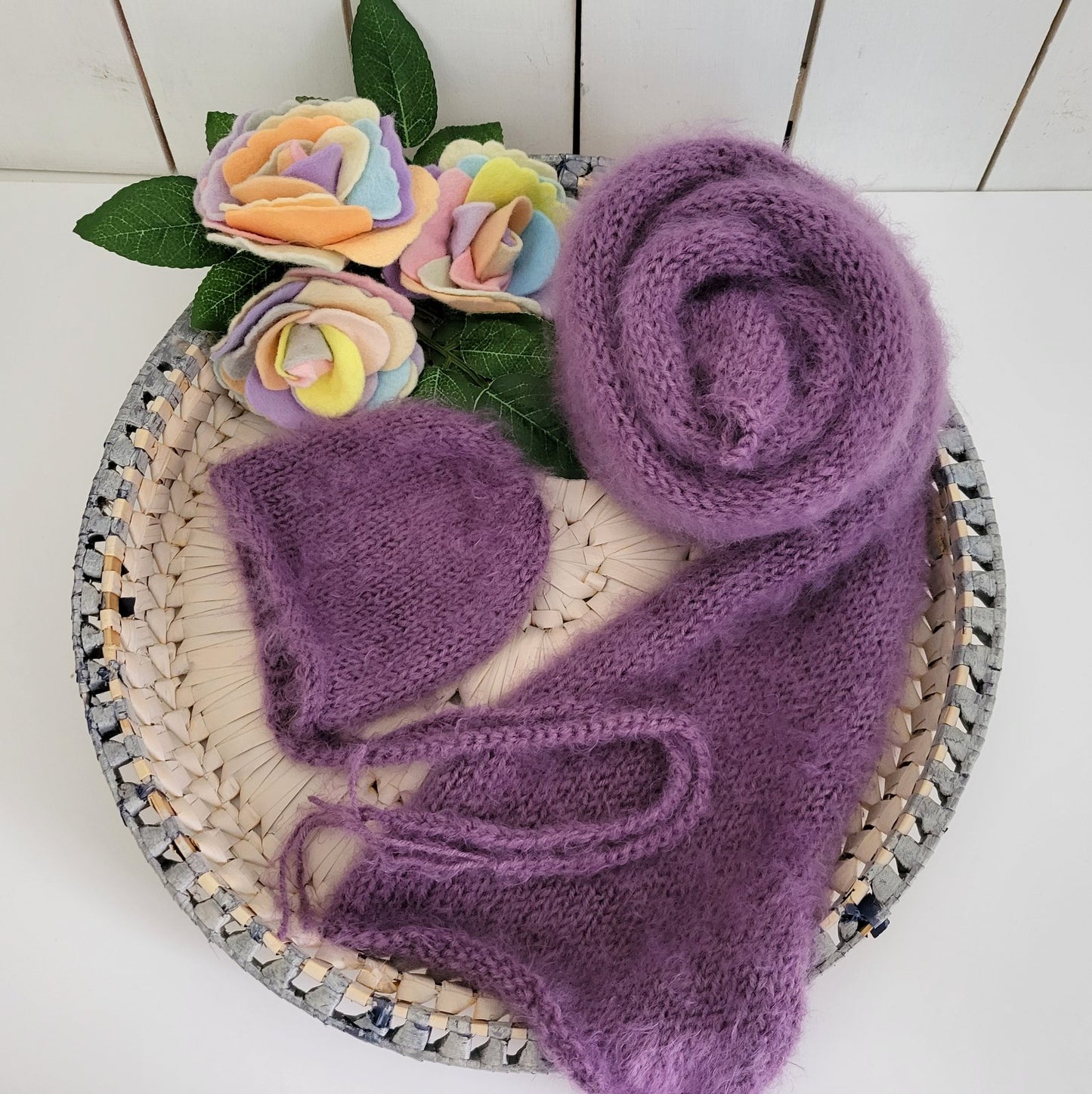 fluffy purple knit wrap for newborn photo shoots with matching bonnet