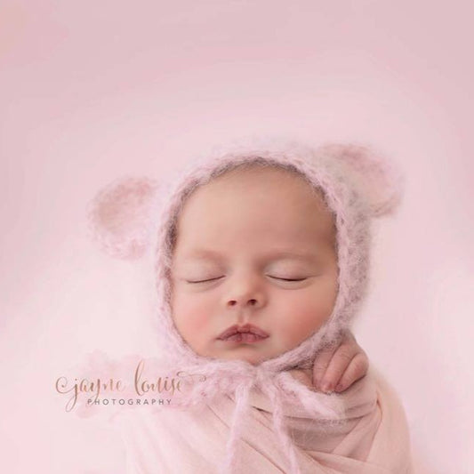pink knitted baby girl bonnet