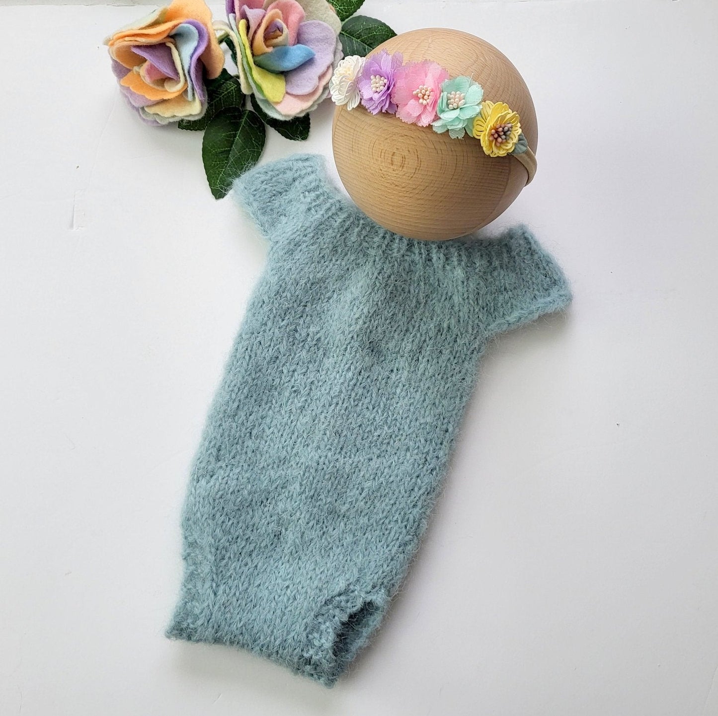 light blue knitted newborn baby romper with flower headband