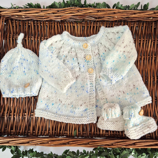 handknit baby cardigan hat and bootie set for a baby boy white with brown and blue speckles