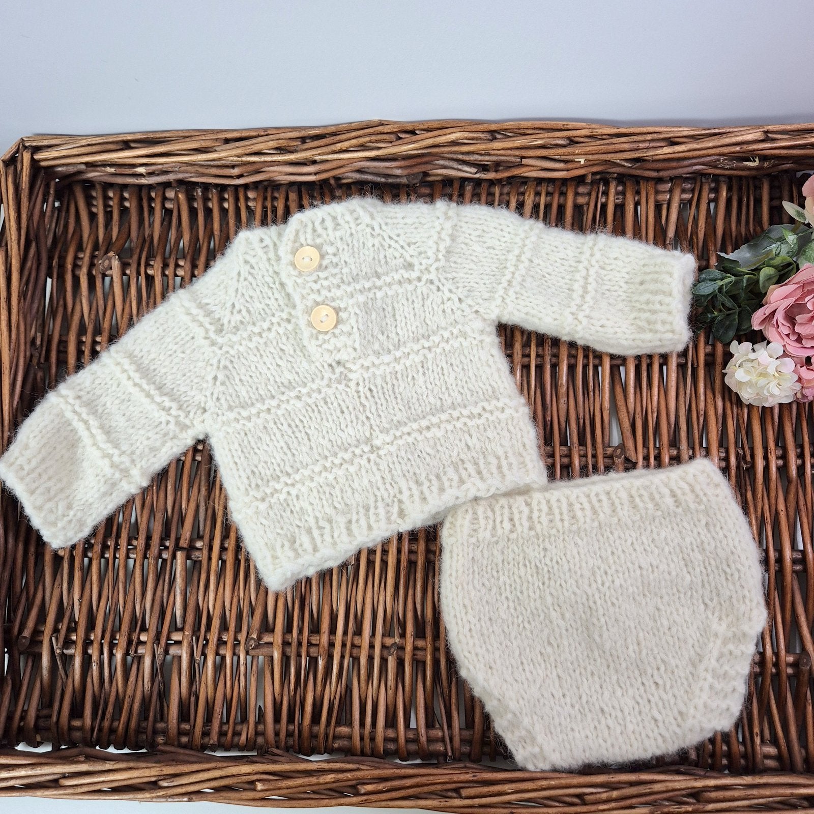 Gorgeous Handknit newborn baby chunky sweater and pants set. Made in size newborn- which is perfect for a baby under 20 days old, as a photography prop, or hospital coming home outfit.