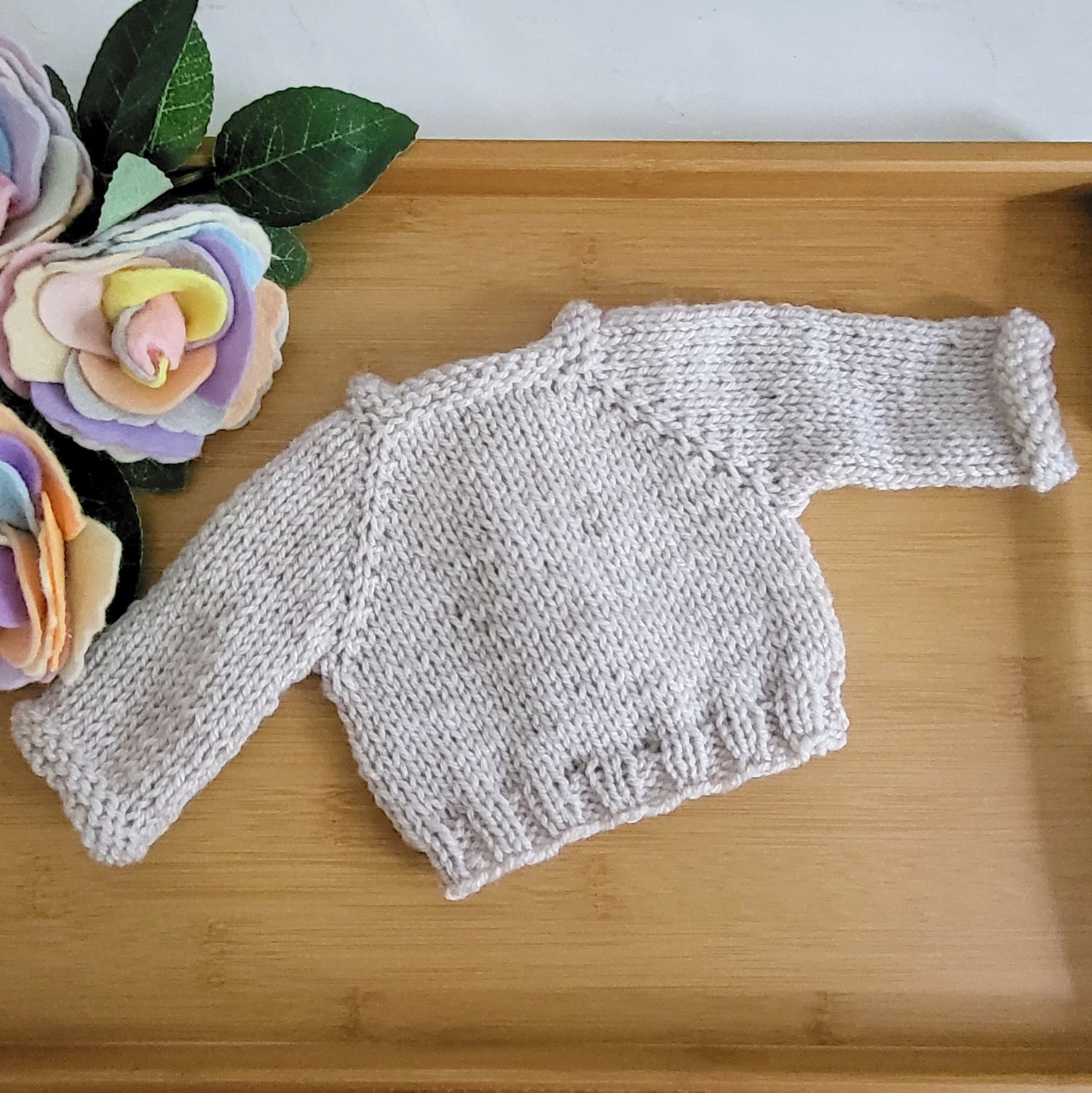 knitted beige baby jumper for newborn photo shoots