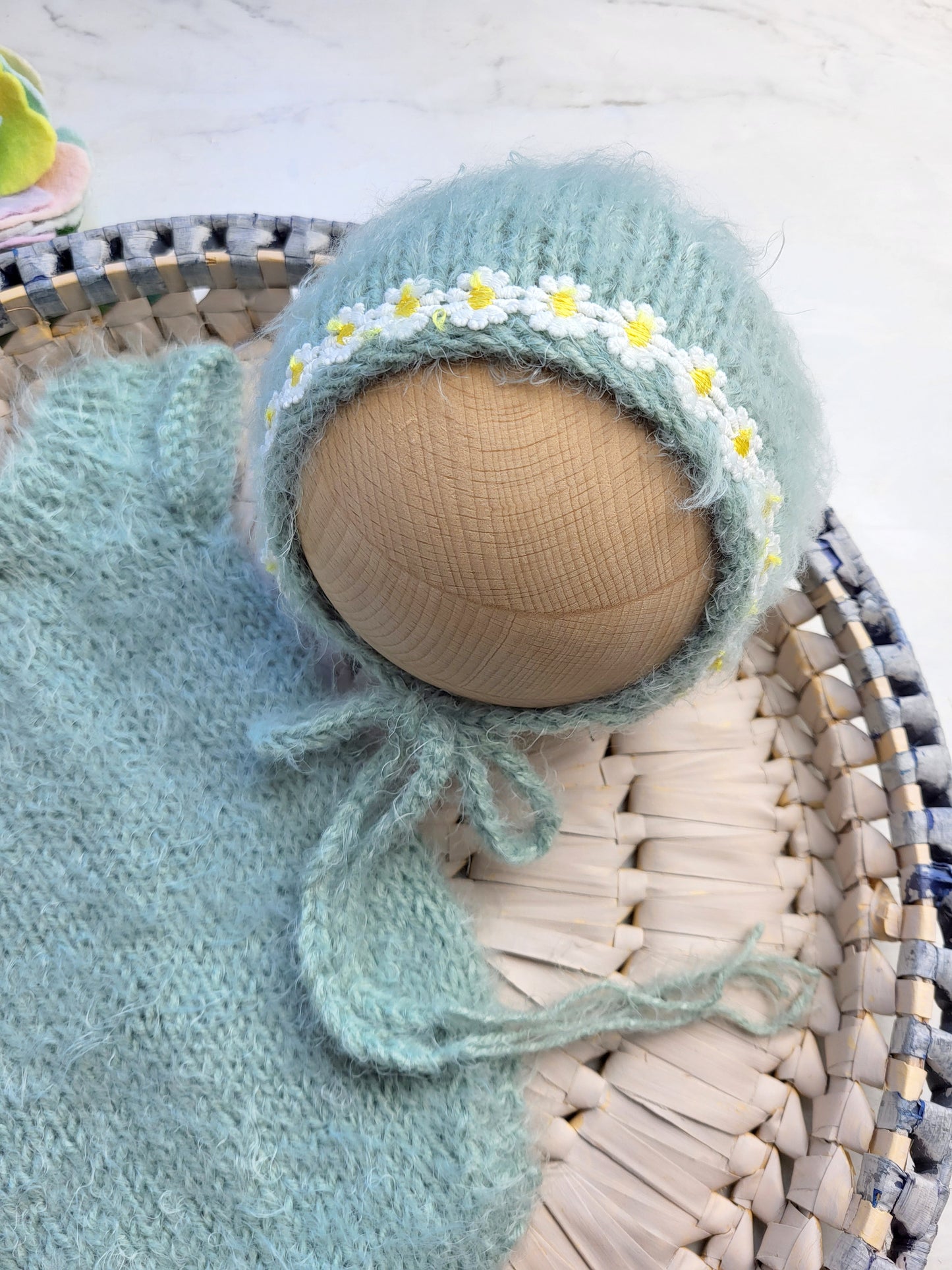 handmade baby girl bonnet in soft green with flowers