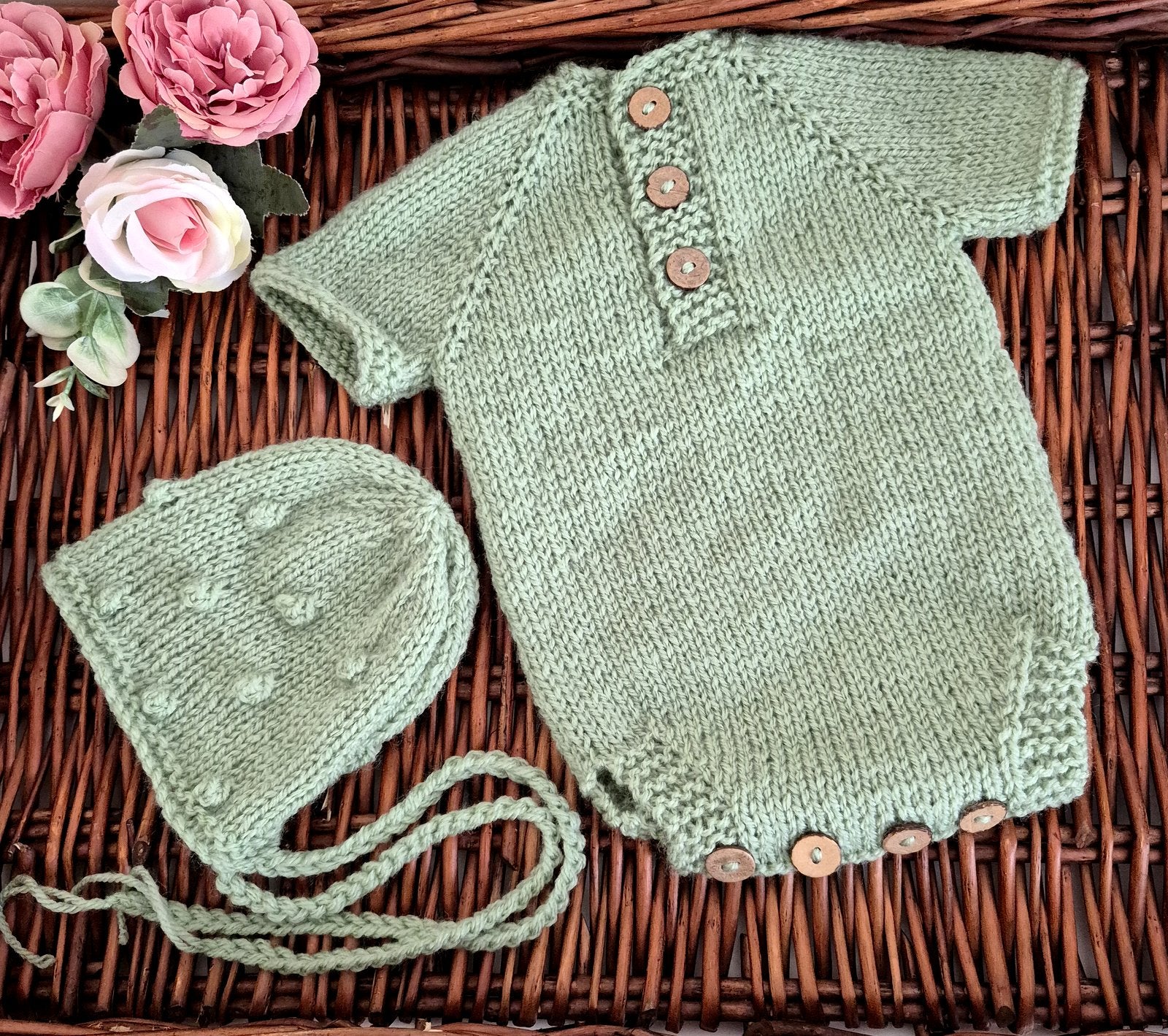 Handmade knitted sage green newborn baby romper and bonnet set. Ready to send.

The bodysuit-style romper outfit has all-over popcorn bubble texture, with short sleeves. It has wooden button fastenings at the back neck and diaper opening, designed for newborns under 20 days old. Perfect as a hospital coming home outfit, newborn photography prop, or baby shower gift.

Knitted using my own original designs, shipped ready to gift&nbsp; in an organza bag. Dispatched from the UK.

Ideal for first photos and spec
