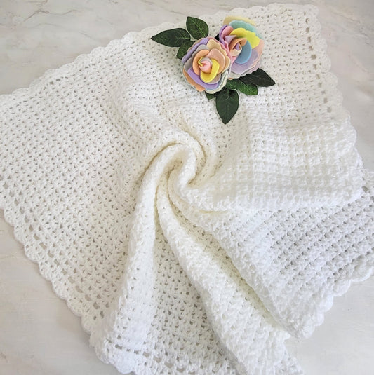 white crochet new baby blanket for a baby shower gift