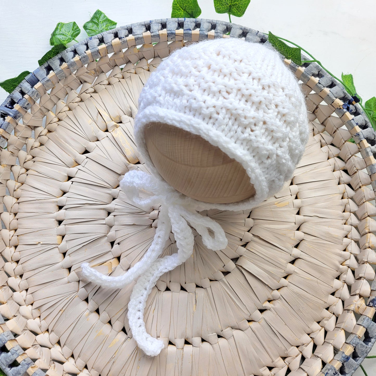 white textured knit baby bonnet