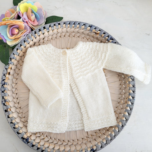 handmade knitted cream baby cardigan matinee jacket, knitted baby gift or coming home outfit
