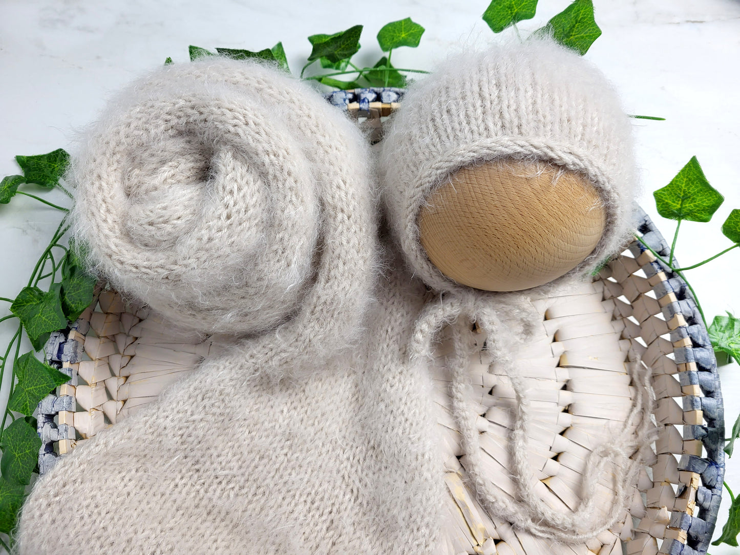 knitted light beige ecru baby bonnet and newborn photo props
