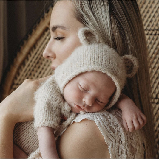knitted beige bear romper and bonnet set for newborn babys first photos
